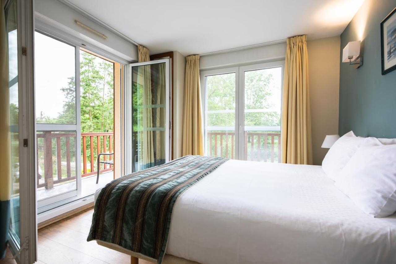 Karma Manoir Des Deux Amants Aparthotel Connelles Bagian luar foto